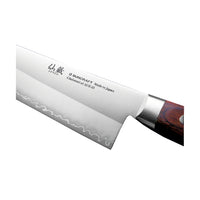 Lähikuva Suncraft SENZO Clad Santokuveitsen terästä, jossa näkyy hienostunut kuviointi ja Made in Japan -merkintä.