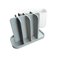 Kylpyhuoneteline - Kylpyhuoneen järjestelijä purettuna osiin, esittelee sisäiset lokerot ja irrotettavan pohjan helppoa puhdistusta varten.