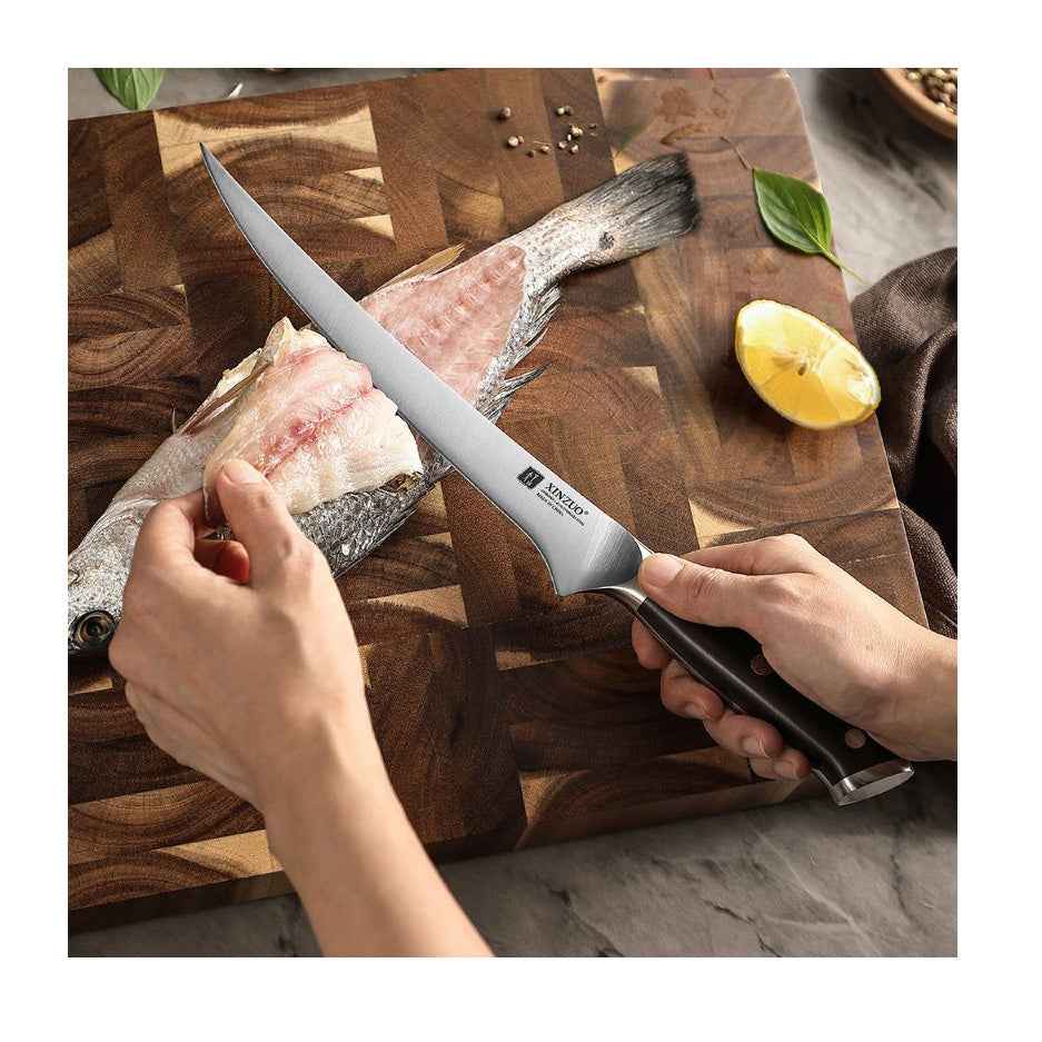 Xinzuo Fileerausveitsi 23 cm käytössä kalan fileoinnissa, terävä ja kestävä veitsi ammattilaisille keittiöön.