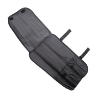 Avoin Giesser veitsilaukku ilman sisältöä, useilla taskuilla veitsien säilytykseen ja tarrakiinnityksillä.