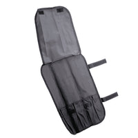 Avoin Giesser veitsilaukku ilman sisältöä, useilla taskuilla veitsien säilytykseen ja tarrakiinnityksillä.